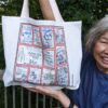 White canvas tote bag featuring My Baby Boomer Chinatown sublimation printed artwork by Irene Wong